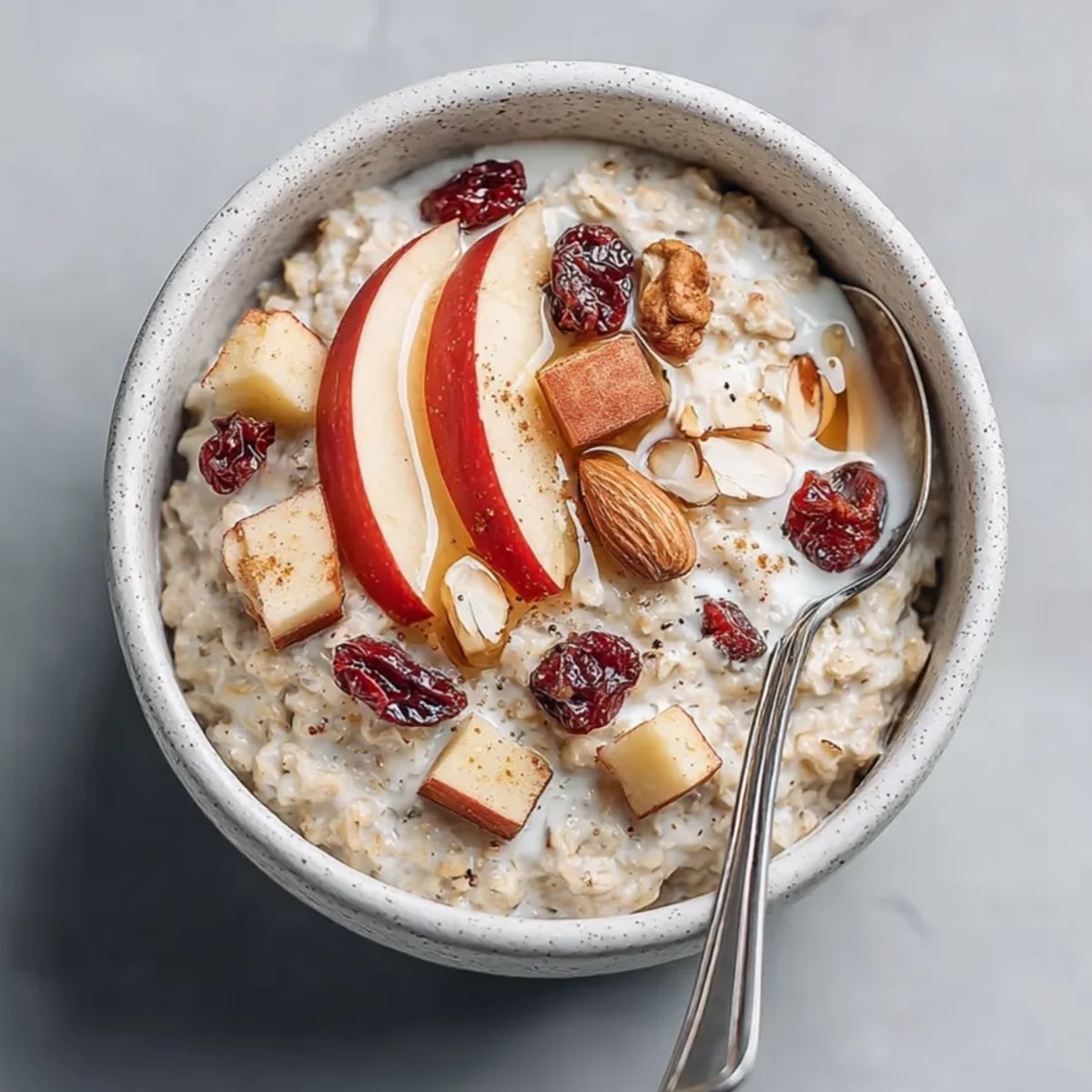 Easy Cinnamon Apple Overnight Oats: chilled, layered with fresh applesauce and crunchy granola.
