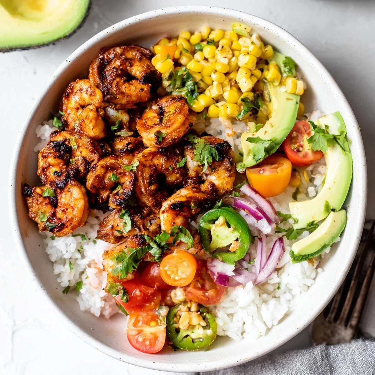 Bright and colorful Easy Grilled Shrimp Bowl served over fluffy rice with fresh toppings.