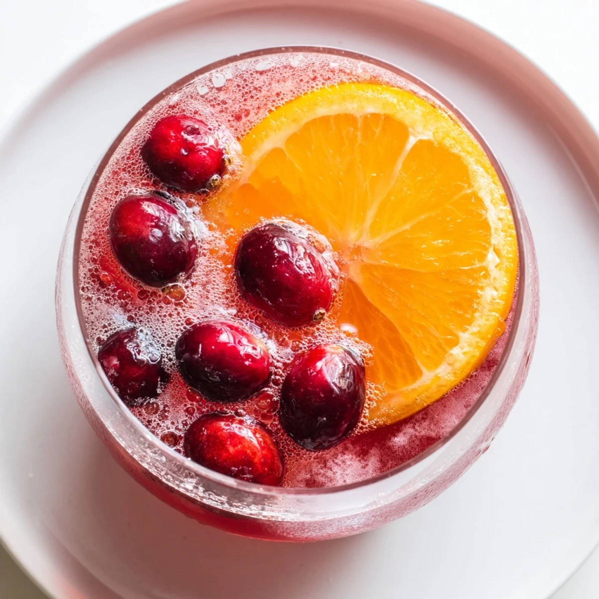 This 3-Ingredient Holiday Punch sparkles with bubbly ginger ale, perfect for your festive Christmas party.