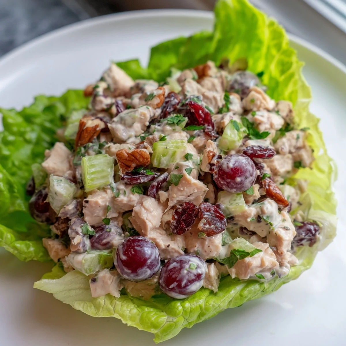 A close-up of delicious festive chicken salad cups, ready to enjoy at your next party.