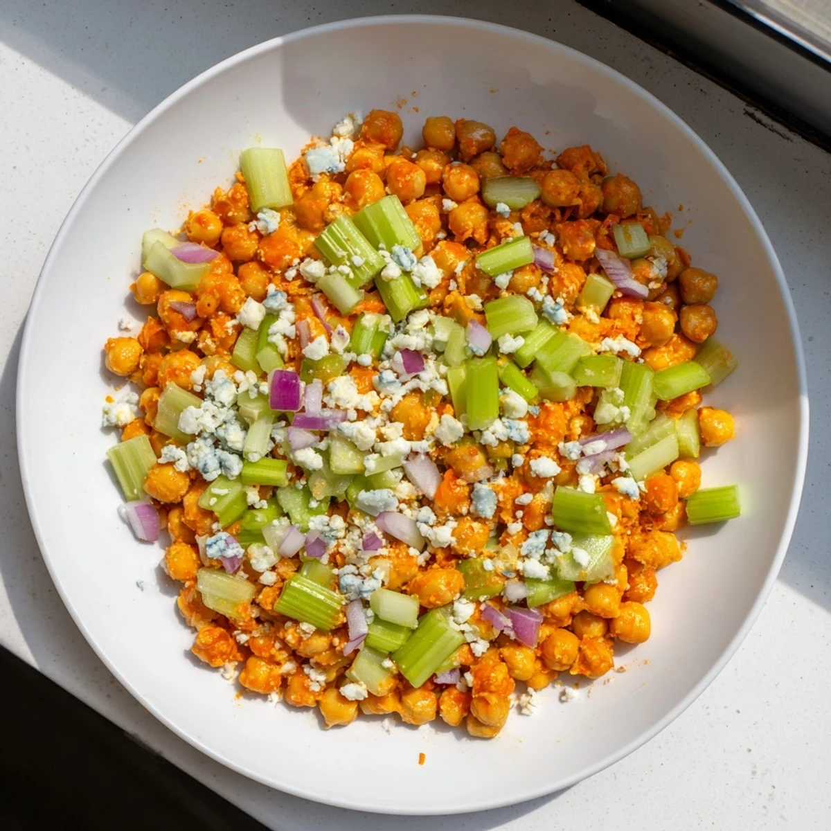 Close-up of the flavorful buffalo chicken bean salad, perfect for a quick, healthy lunch or side dish.