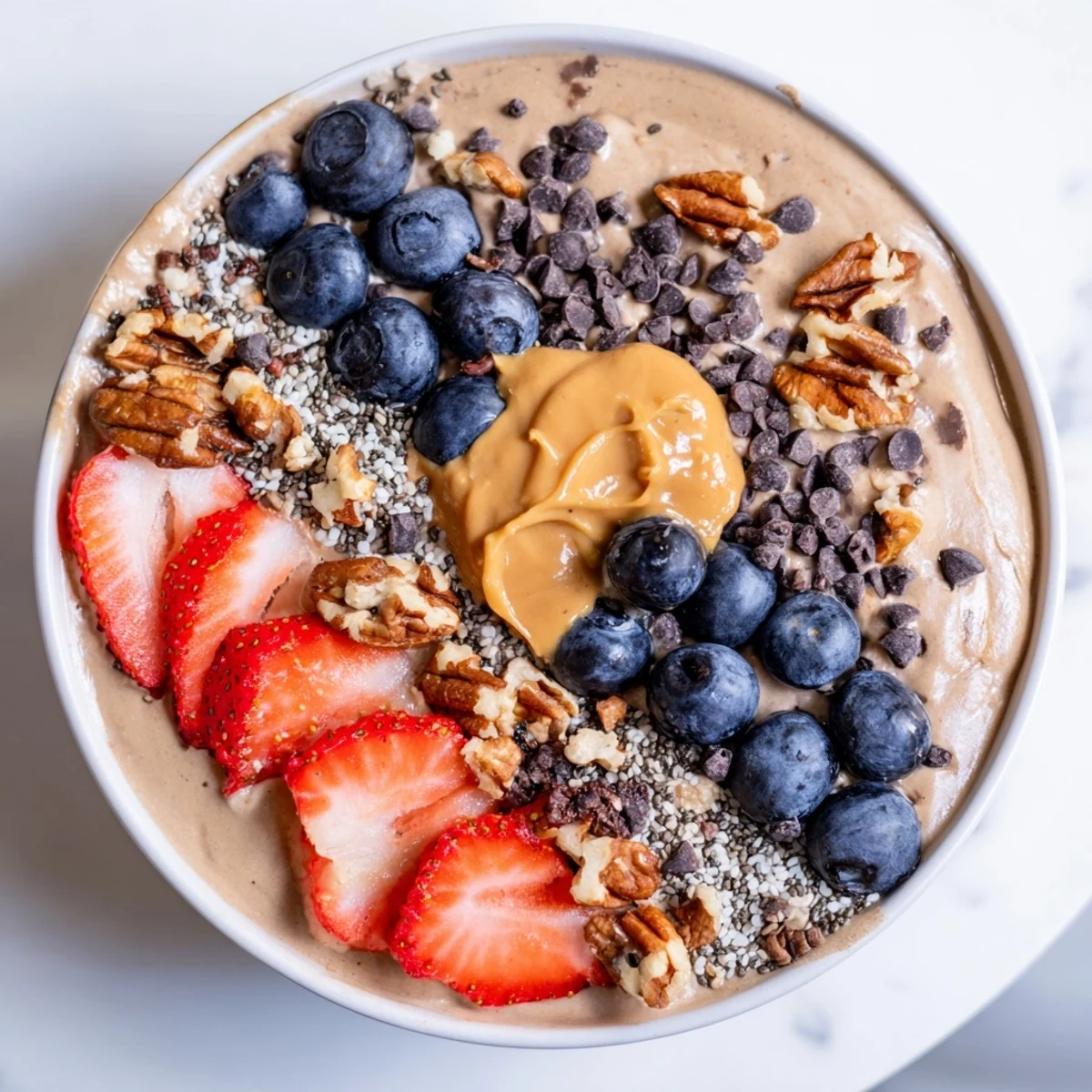 A rich and delicious Protein Ice Cream Bowl, ready to be topped with your favorite healthy additions.