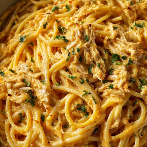 A bowl of creamy chipotle chicken spaghetti.