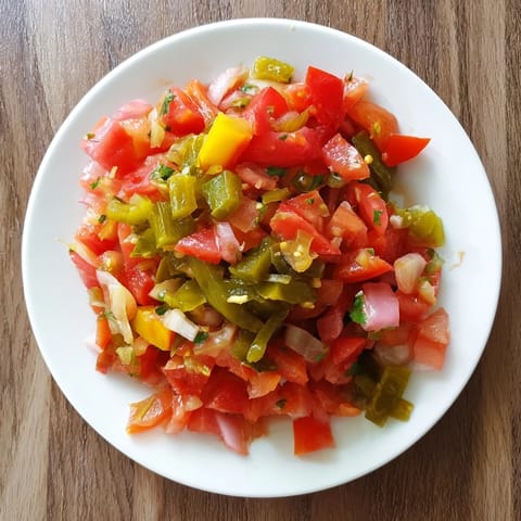 Close-up of bright, chunky Pickle De Gallo Salsa with vibrant green cilantro and spicy jalapeño.