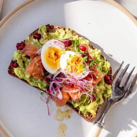 Creamy avocado spread on toast, complemented by delicious toppings in this Express Holiday Avocado Toast Bar.