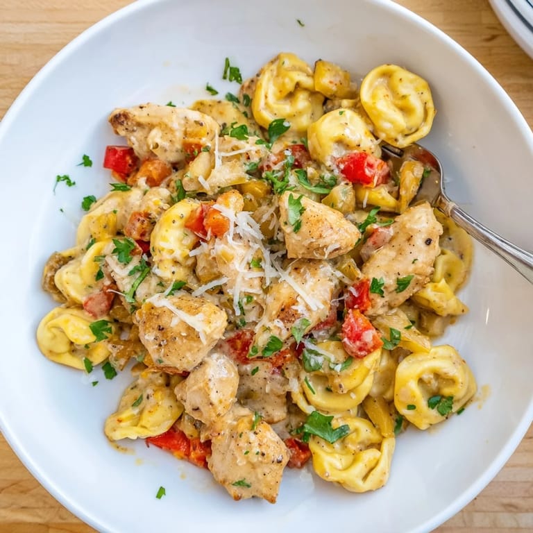 Delicious Zesty Cajun Garlic Parmesan Chicken Tortellini with tender chicken and cheesy pasta.