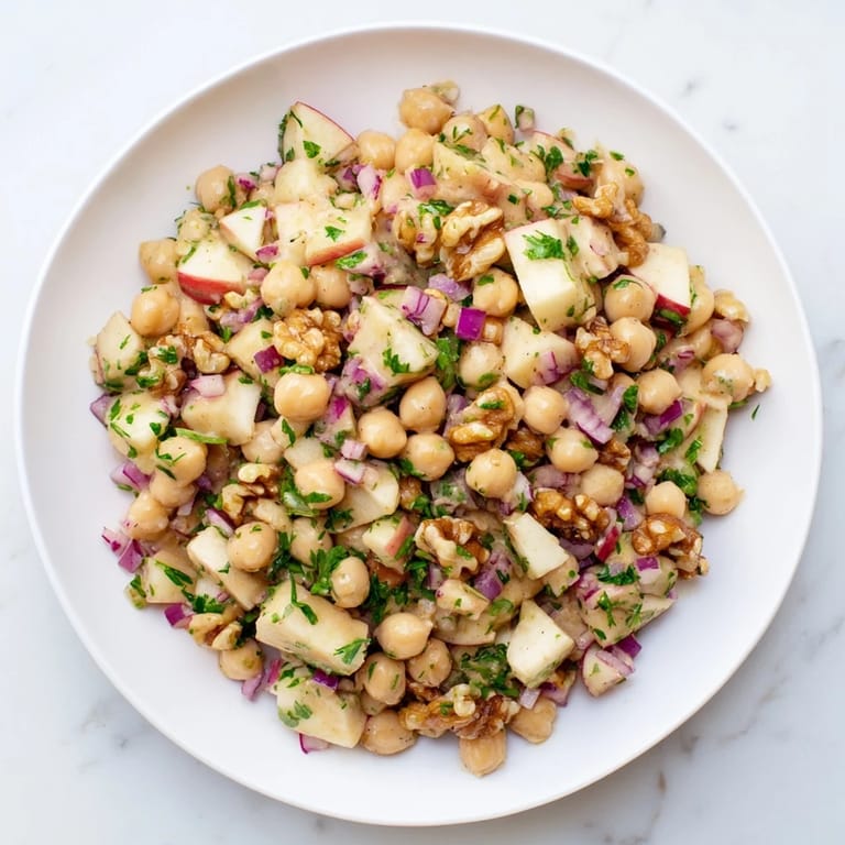 See the beautiful Fall Harvest Apple and Chickpea Salad, with crisp apples, for a light and healthy meal.